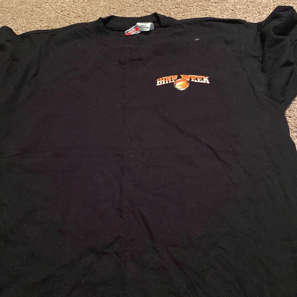 It has black orange red white blue yellow on the back